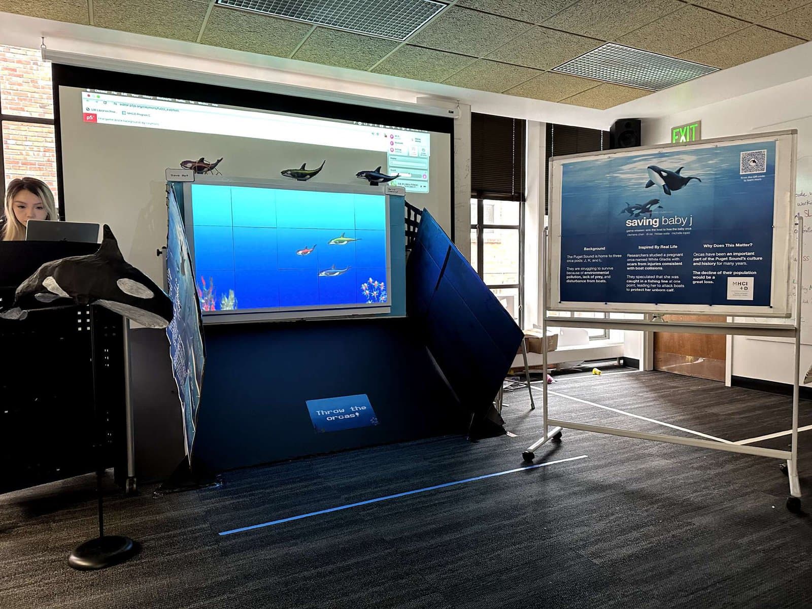 Finished booth with projected game and plush return slide