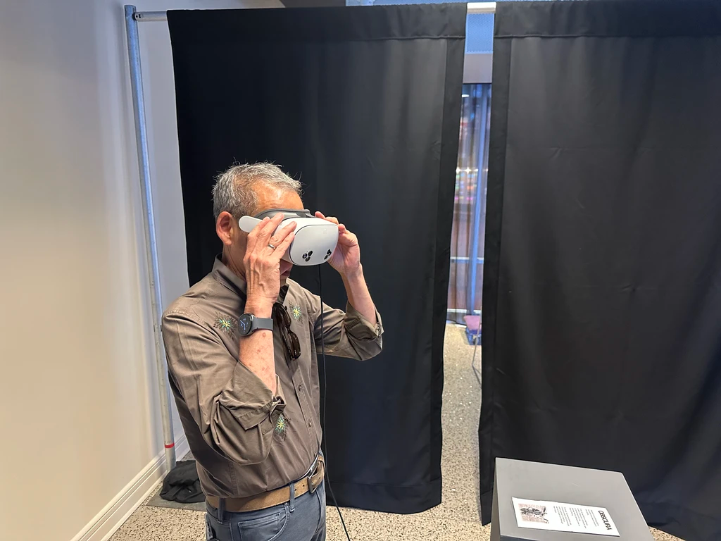 Visitor experiencing Obscura VR exhibition